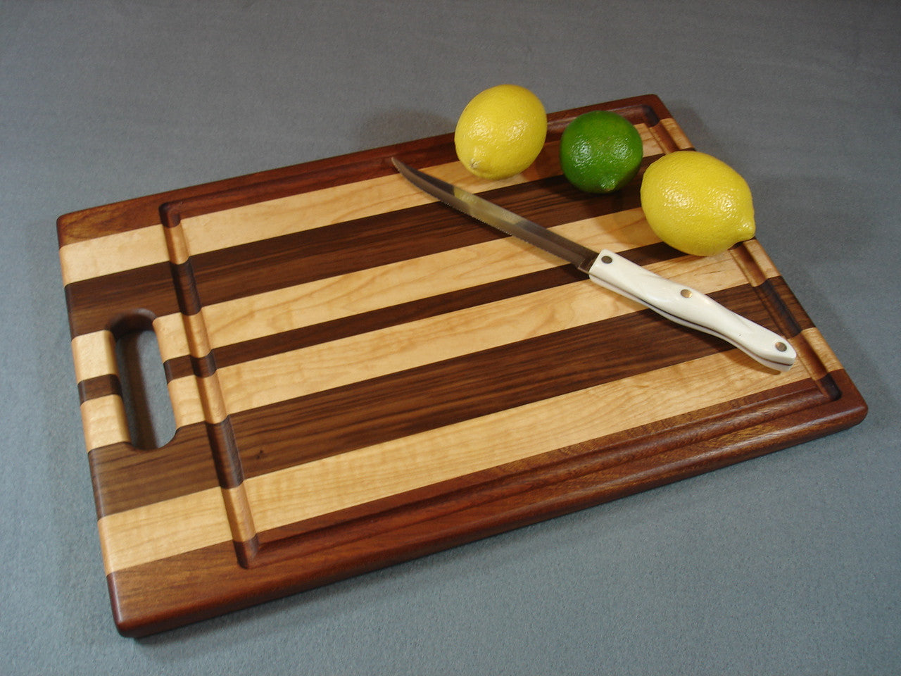 Woodland Series Large Cutting Board with Handle - Sapele, Maple